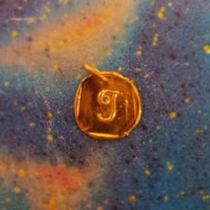 Gold Waxing Poetic Initial Charm